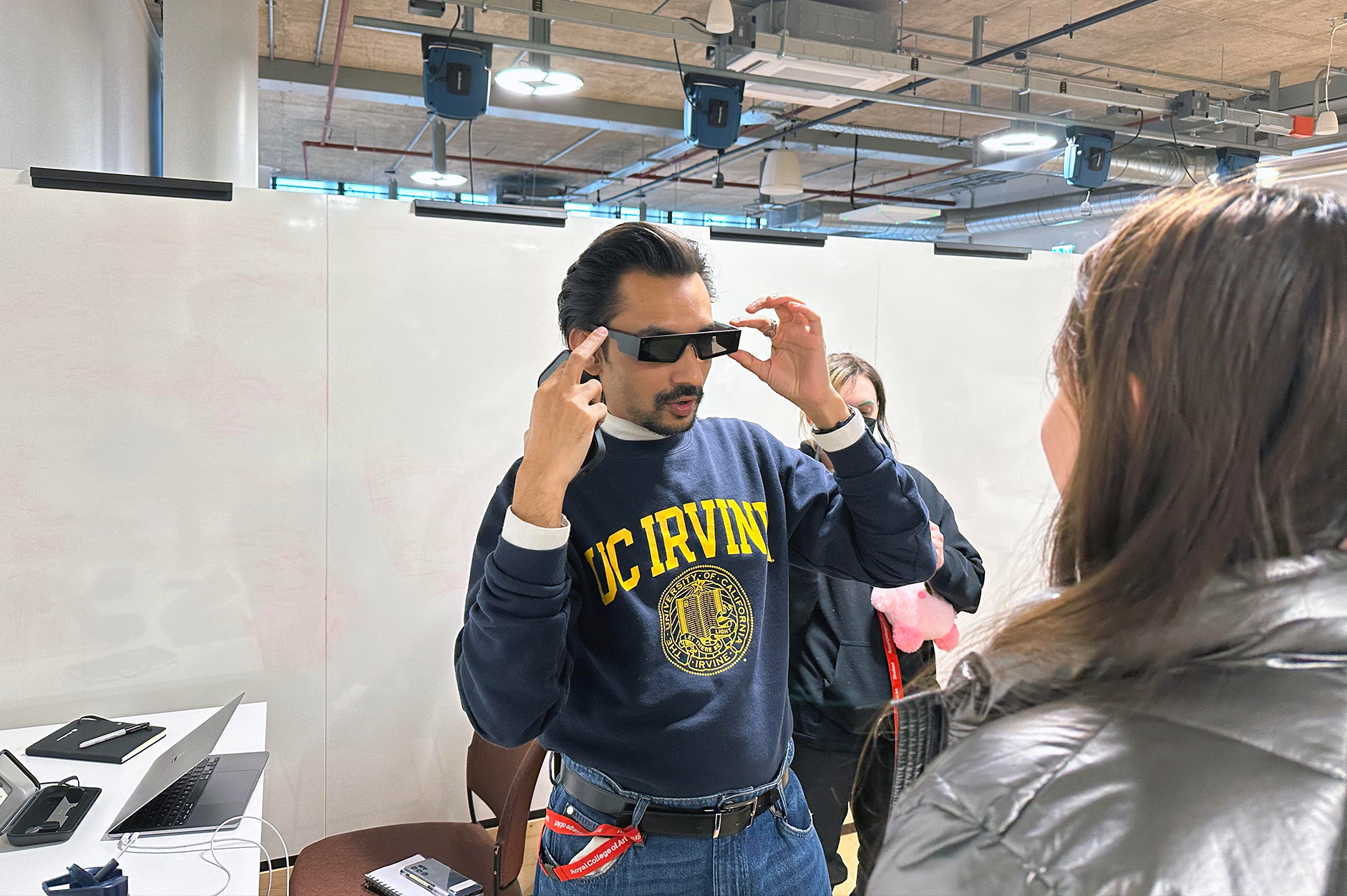 A student tries on the new futuristic AR Spectacles