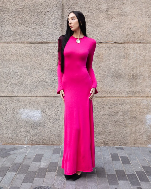 woman in a city wearing a cashmere dress