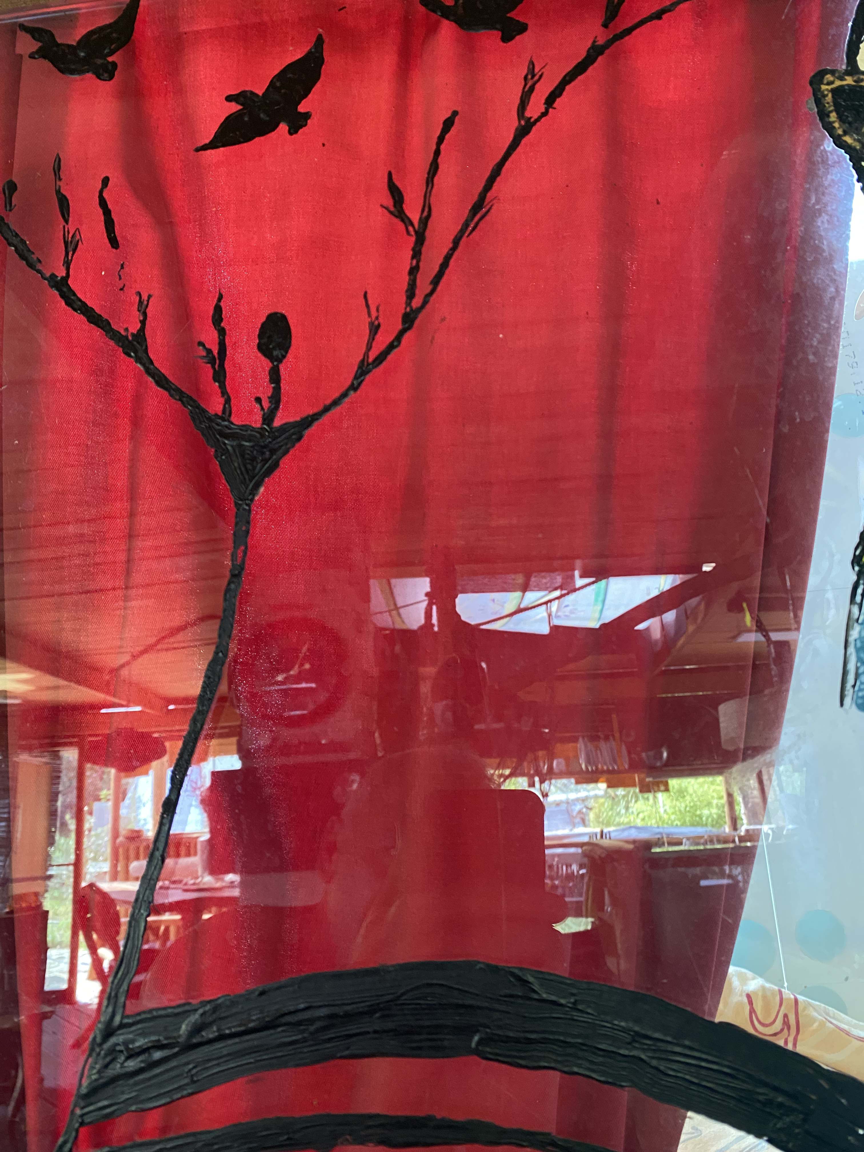 Red curtain birds