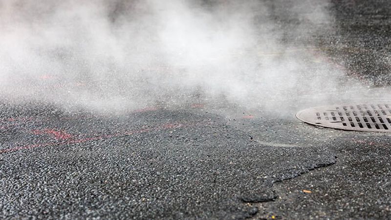 Steam Coming Out Of Manhole