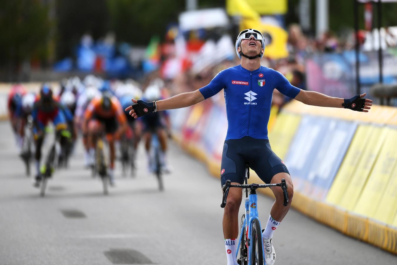 Filippo Baroncini crosses the line first in the Under-23 Road Road at the 2021 World Championships. 