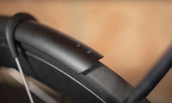 Carefully drilling some holes near the edge of the mudguard will allow you to fit an extension