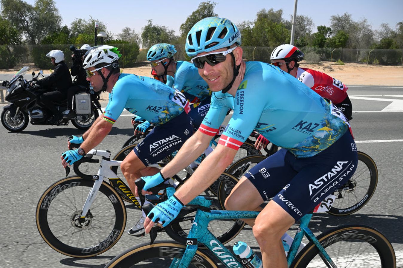Michael Morkov all smiles in front of Mark Cavendish at the UAE Tour 