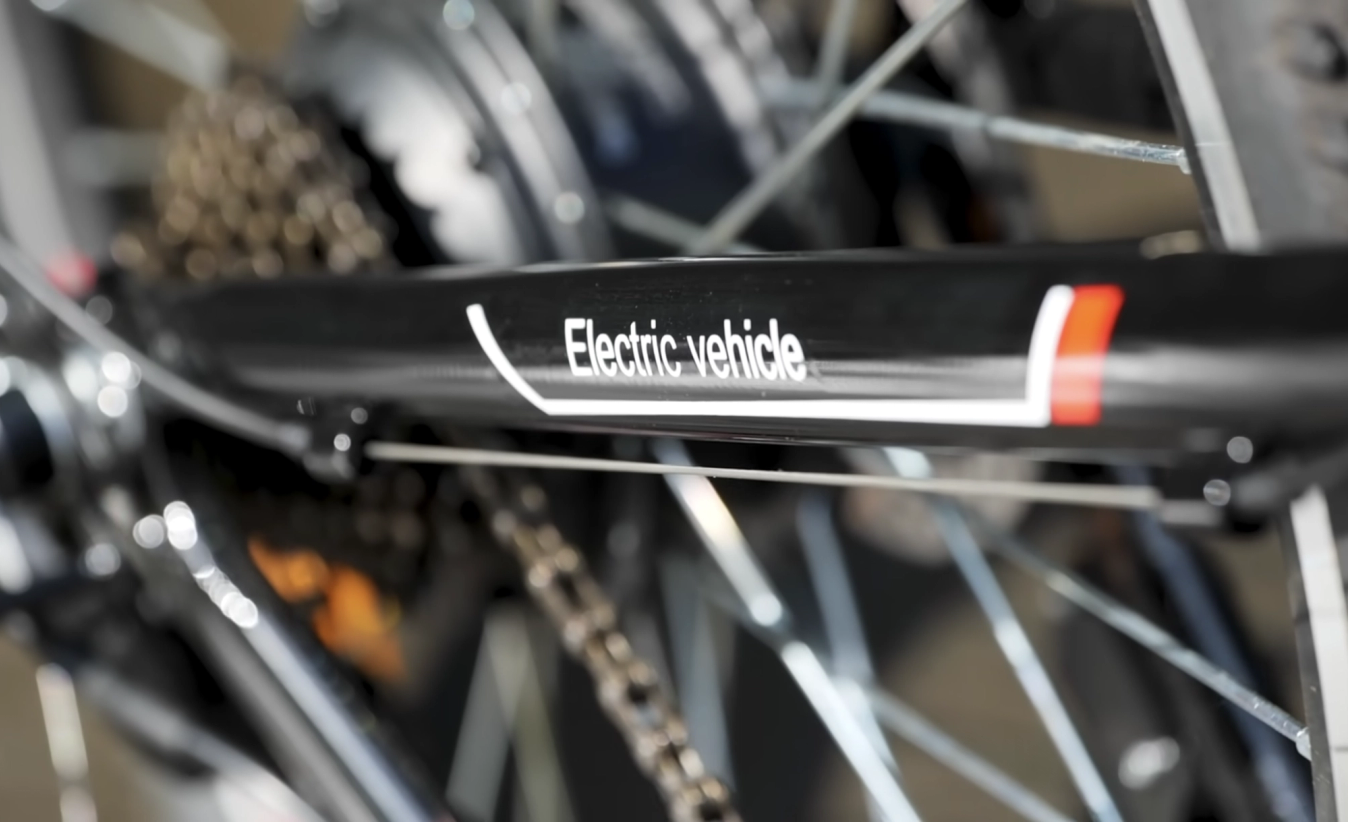 Our e-bike has an 'electric vehicle' sticker on it, controversially