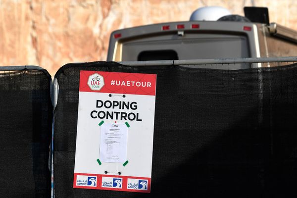 Doping control signs like this signal the riders selected for testing at the finish line