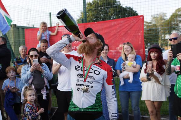 Sean Conway celebrates on the finish line