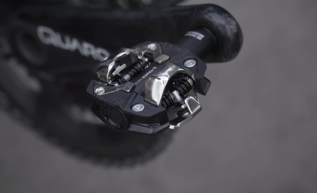 Mountain bike pedals are easier to clip into, and the shoes are easier to walk in
