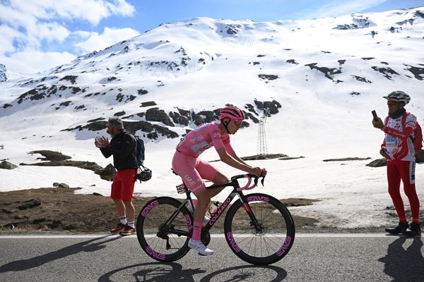 Tadej Pogačar climbs into the snowline on stage 15 of the Giro d'Italia