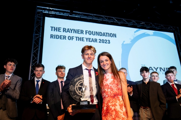 Ollie Knight of Cofidis was handed the Lewis Barry Award for Rider of the Year, before being congratulated by Lizzie Deignan (Lidl-Trek)