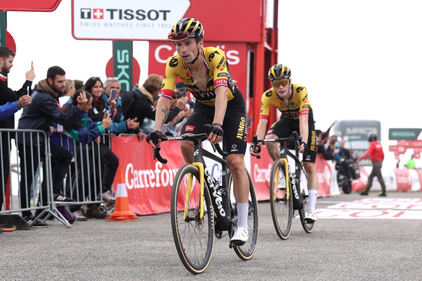 Primoz Roglic and Jonas Vingegaard cross the line on stage 17 of the Vuelta a España