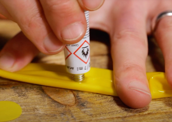 applying glue to inner tube for puncture repair