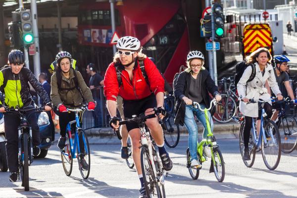 Commuters ride to work in London, the UK's most popular commuting city