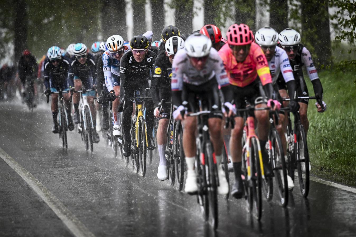UAE Team Emirates and EF Education-EasyPost press on as the rain batters the peloton