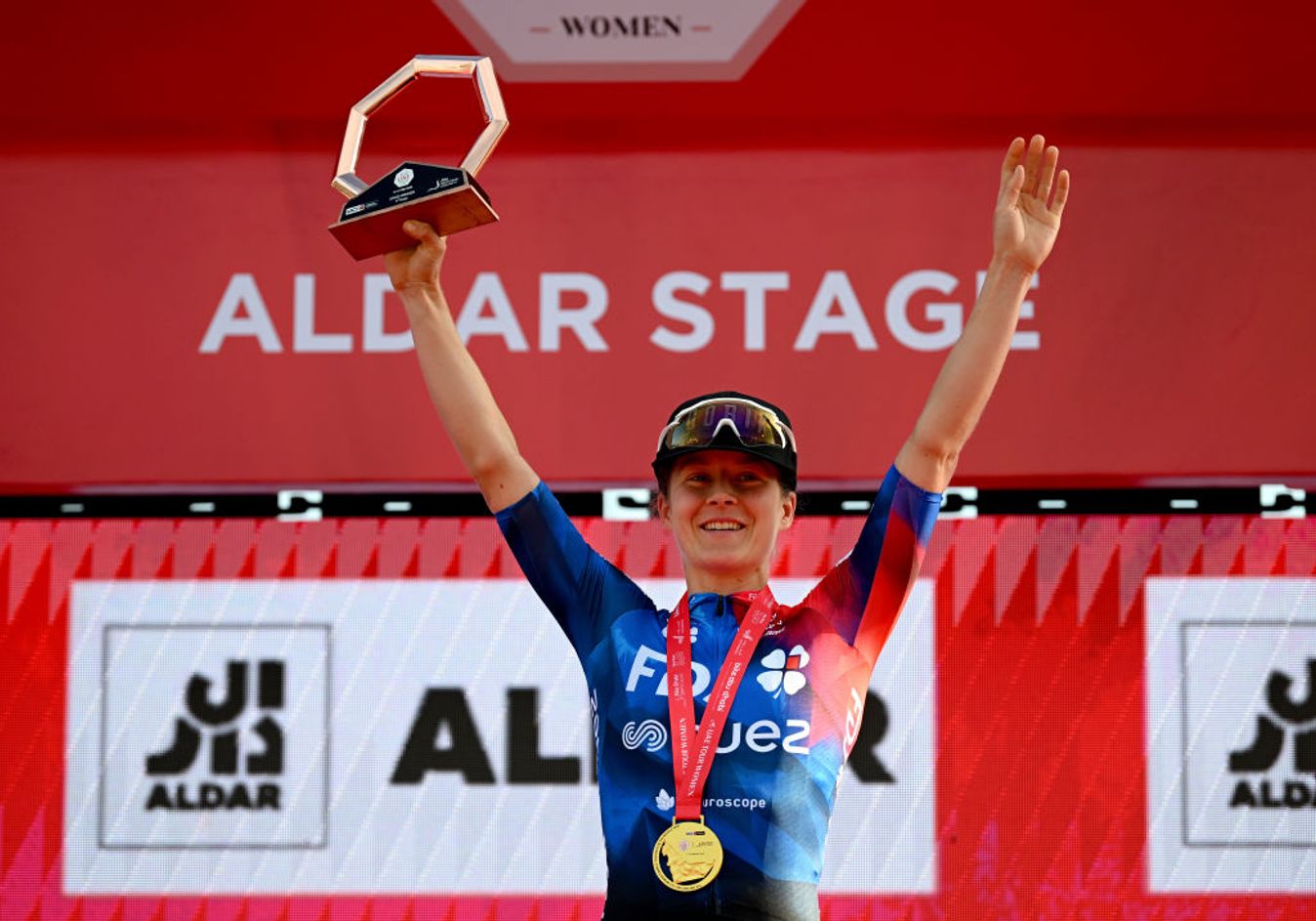 Amber Kraak on the podium as winner of stage 4 of the UAE Tour Women