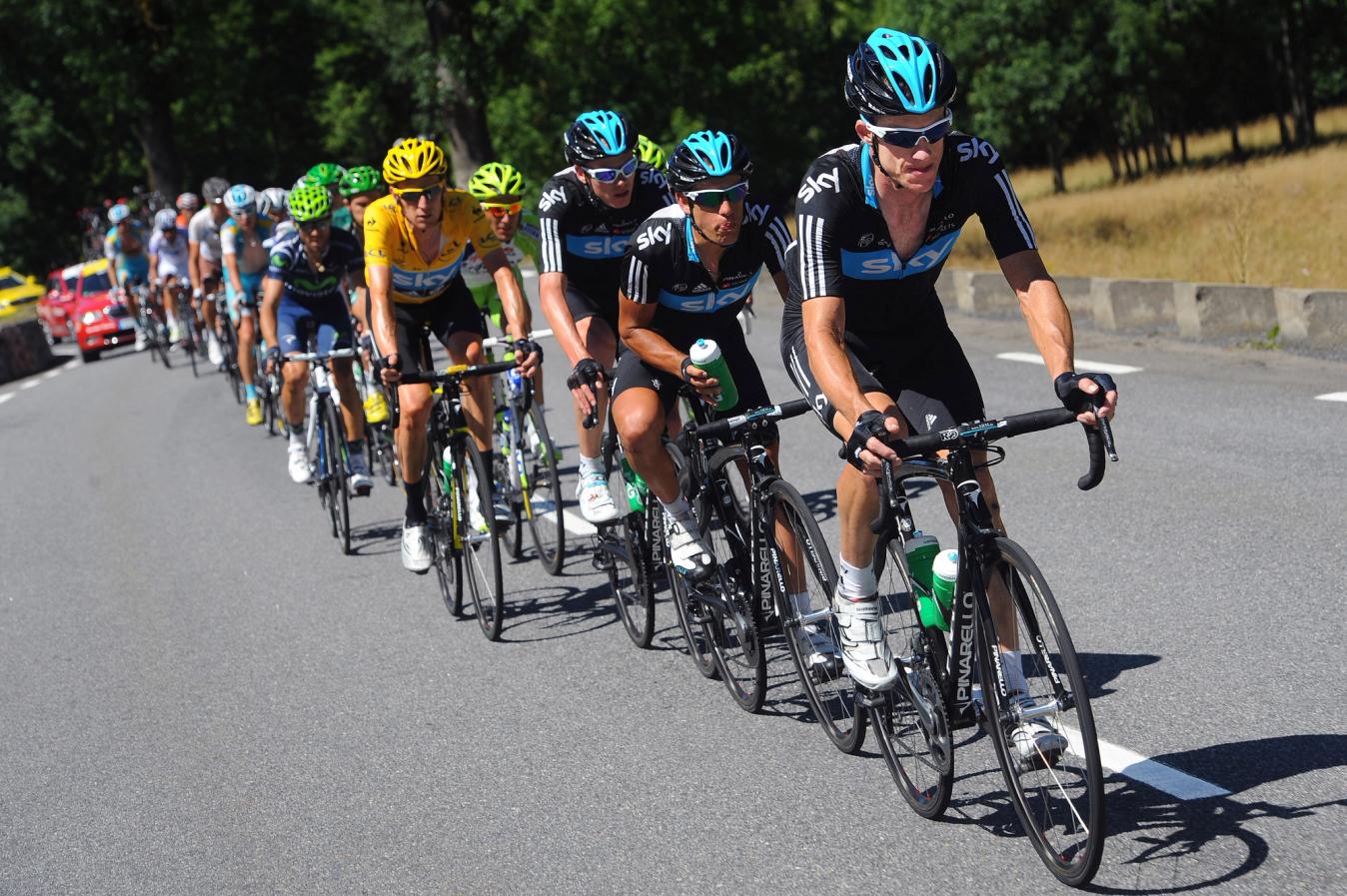 Richie Porte prepares to take over from Michael Rogers as Team Sky string out the peloton in the 2012 Tour de France