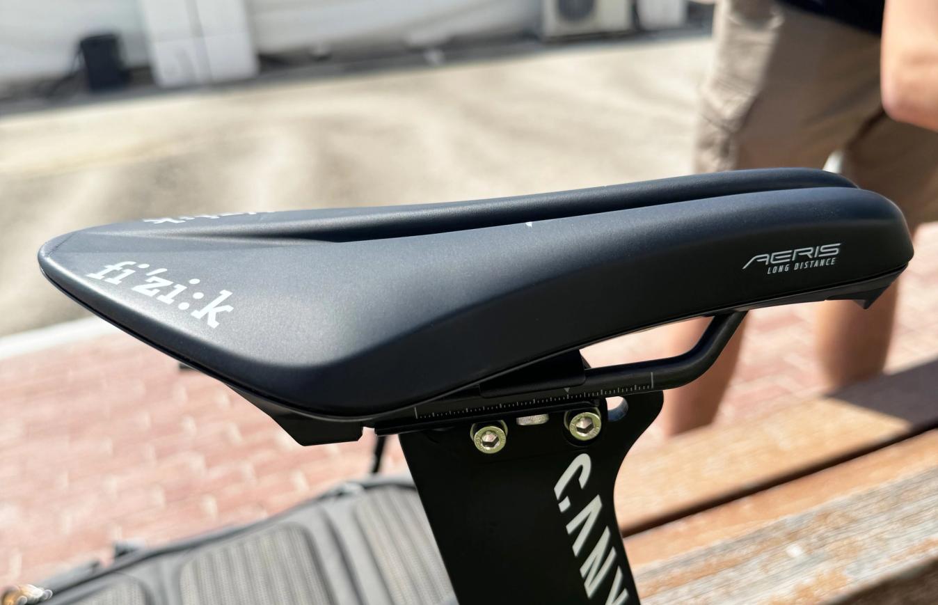 Most riders also opt for a saddle with a significant cut out to alleviate pressure in sensitive areas, like on this Fizik Aeris on Davide Cimolai’s Canyon Speedmax.