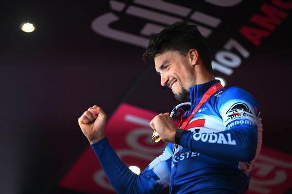 Julian Alaphilippe celebrates on the podium at the Giro d'Italia