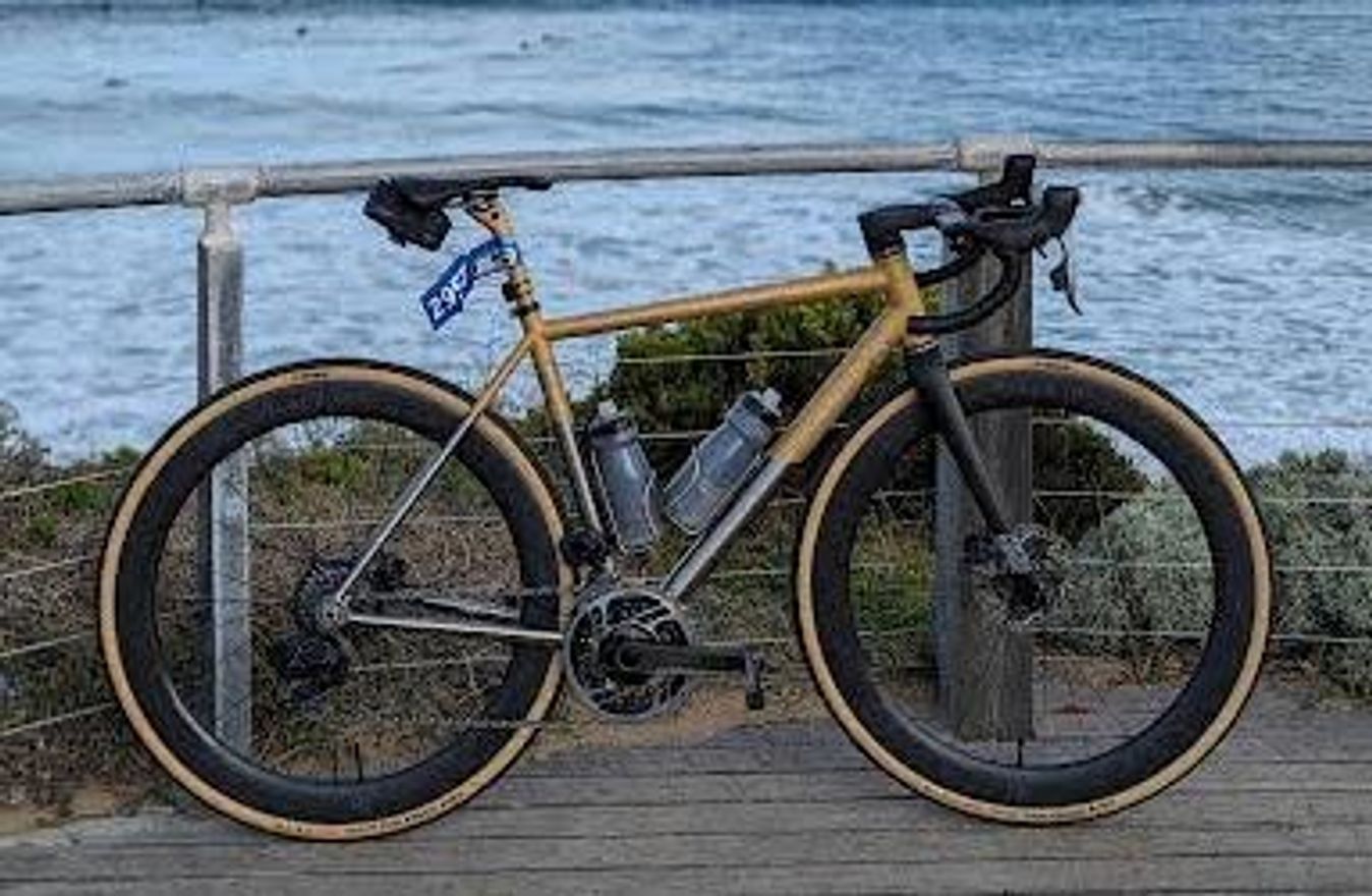 Starting with a very impressive Serk A30M titanium road bike, with a very eye-catching gold coloruway