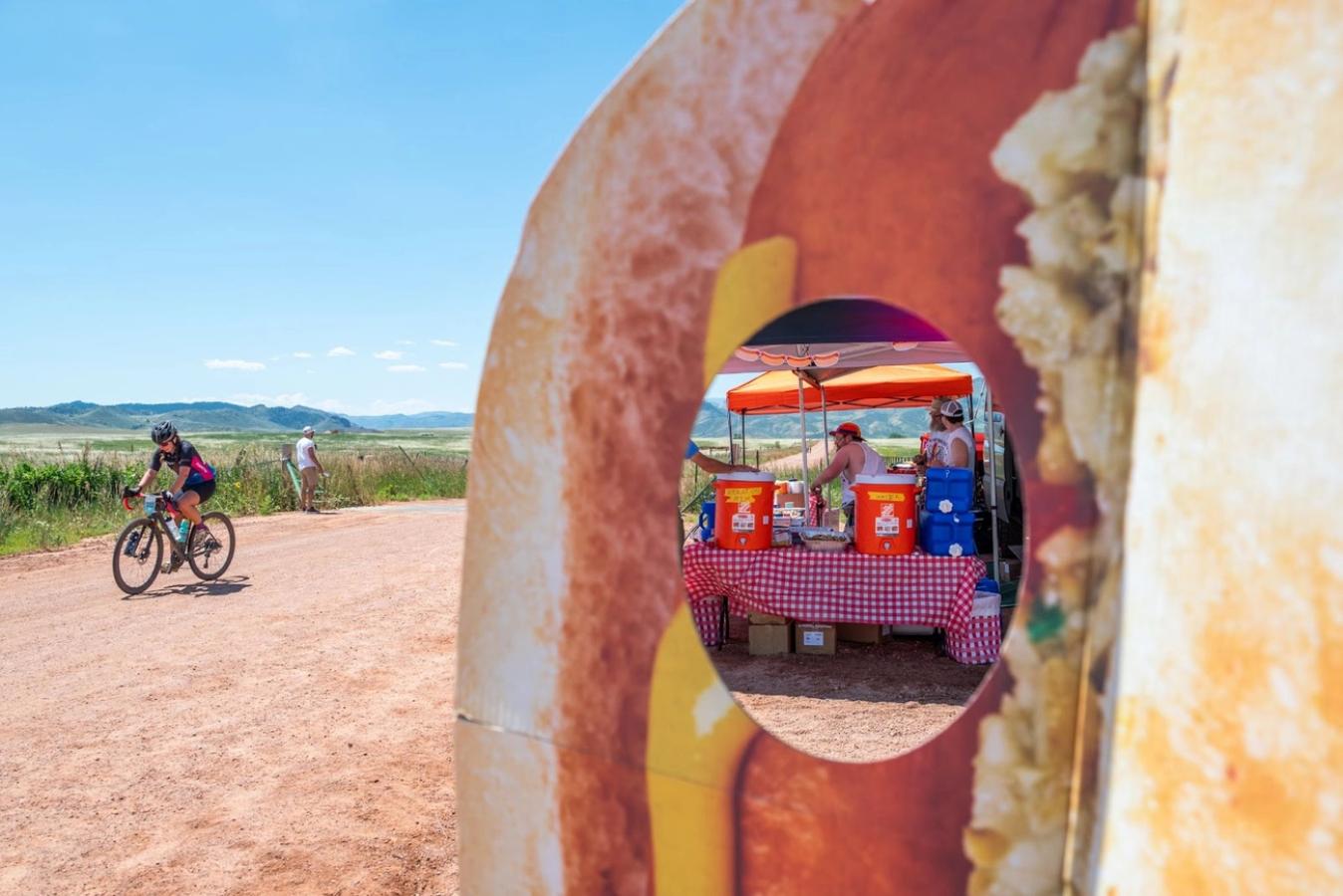 A hot dog themed aid station awaits riders at mile 50, right in time for the huge climb up to 8,000 feet. Consume if you dare