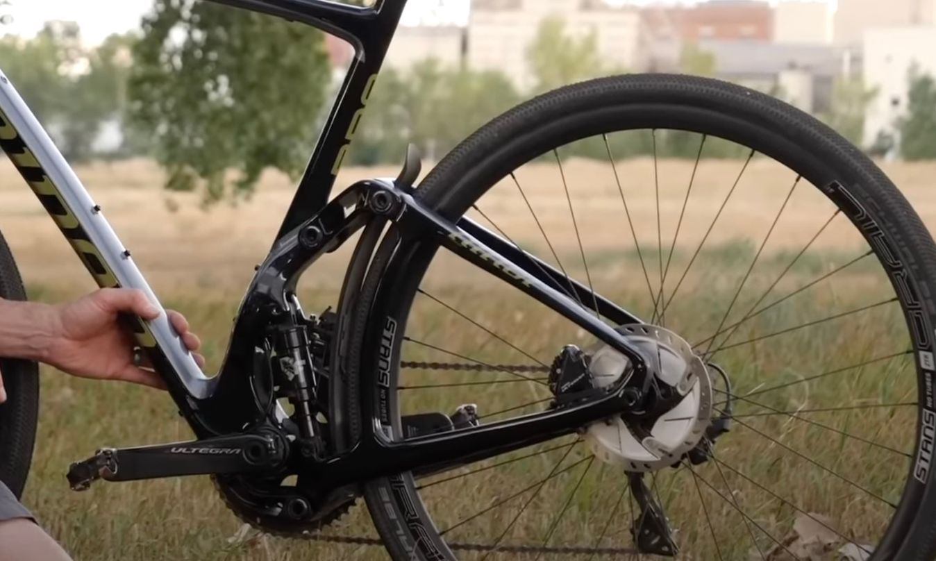 A full mountain bike style rear suspension on a gravel bike