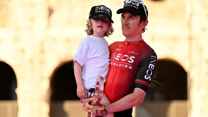 Geraint Thomas and his son on the podium at the Giro d'Italia
