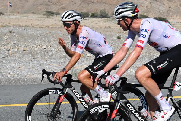 Adam Yates and Vegard Stake Laengen in discussion during stage 3 of the UAE Tour