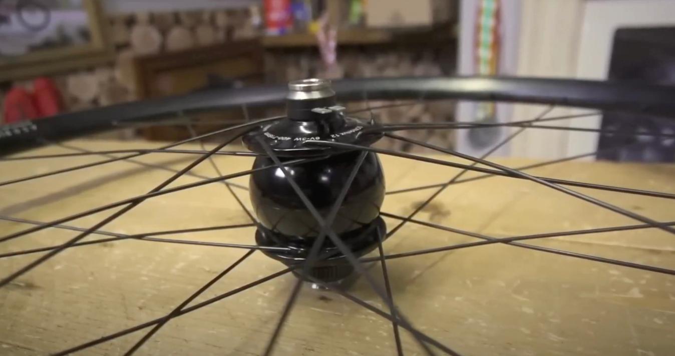 Dynamo hubs convert some of the energy from the rotation of the wheels in to electrical energy