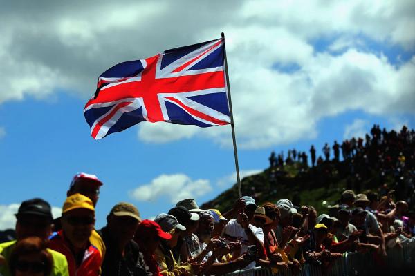 The Union Flag flying high above the crowds at the 2019 Tour de France