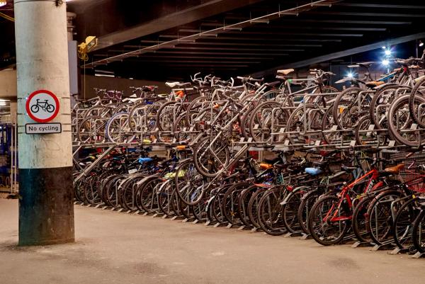 Abandoned bikes take up a lot of space at station bike racks