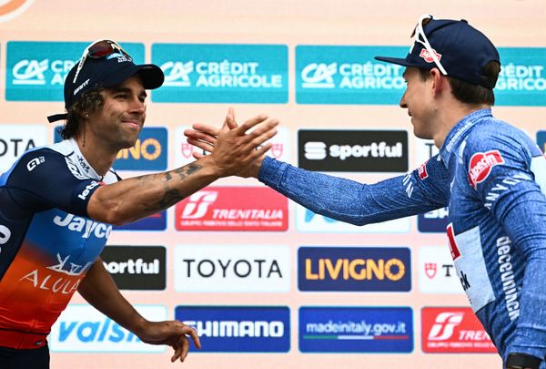 Michael Matthews congratulates Jasper Philipsen on the podium of Milan-San Remo
