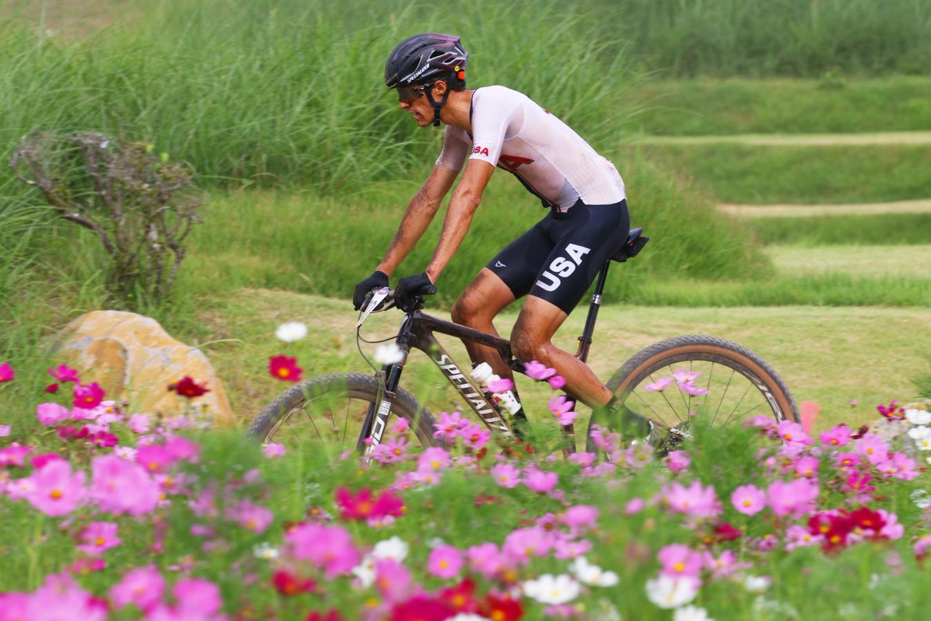 Chris Blevins riding at the 2020 Tokyo Olympic cross-country race