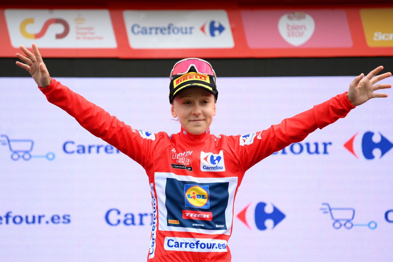 Gaia Realini pulls on the first red jersey of the 2024 Vuelta Femenina