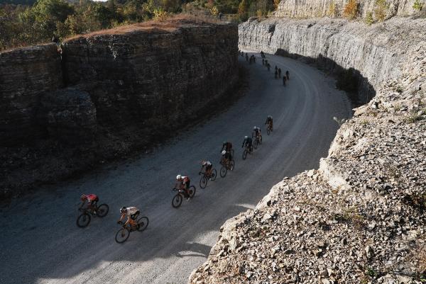 The Life Time Grand Prix peloton racing through the hills of Arkansas