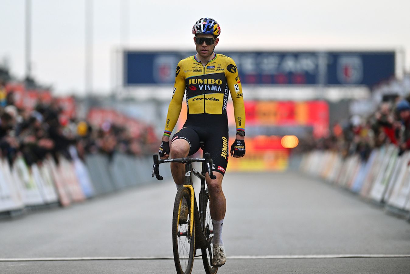 Wout van Aert crosses the line for victory in Heusden-Zolder aboard his gravel bike
