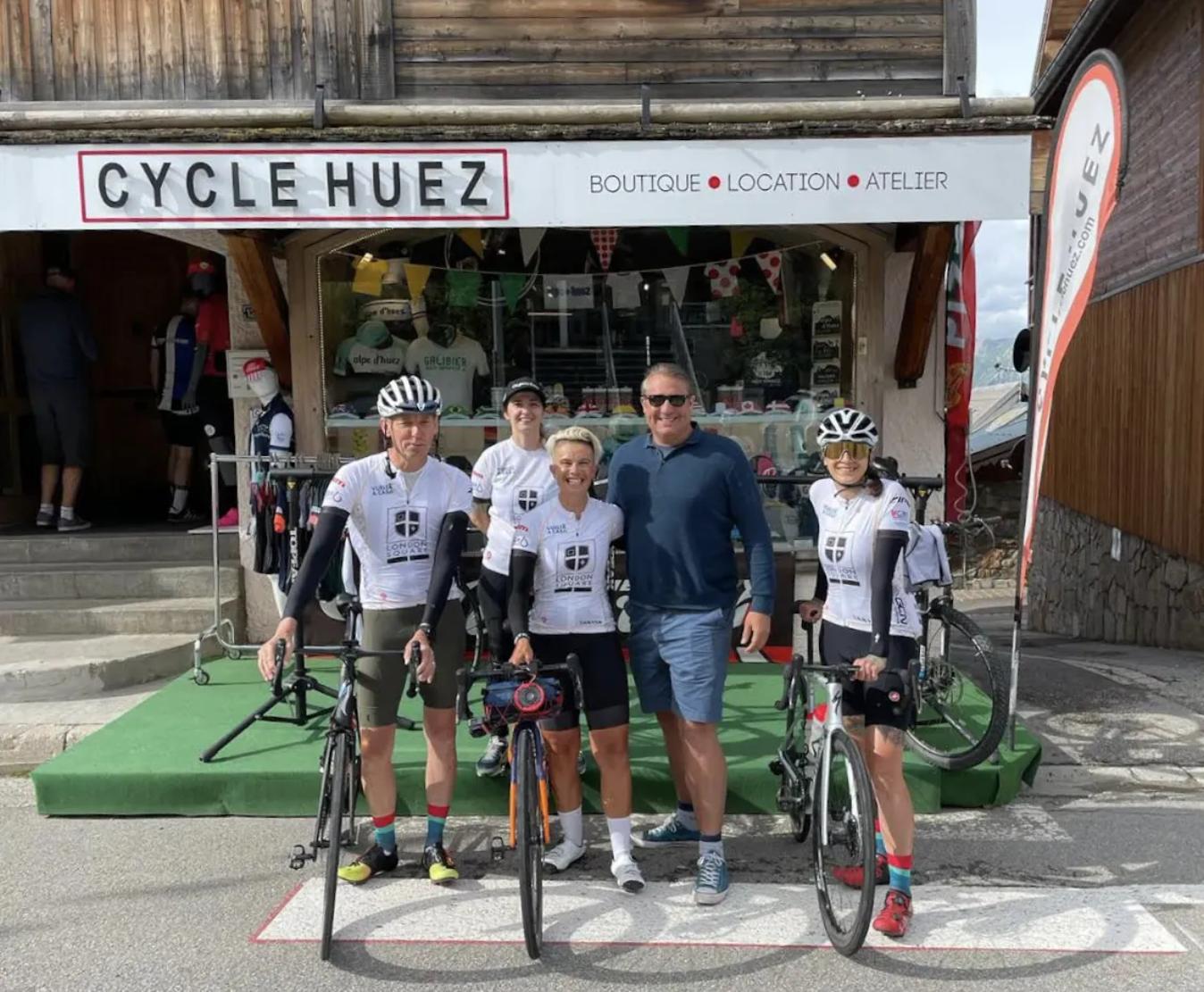 Ottilie and the Vuelta a Casa gang meet up with Dr Chris Lawrence at the top of Alpe d’Huez.
