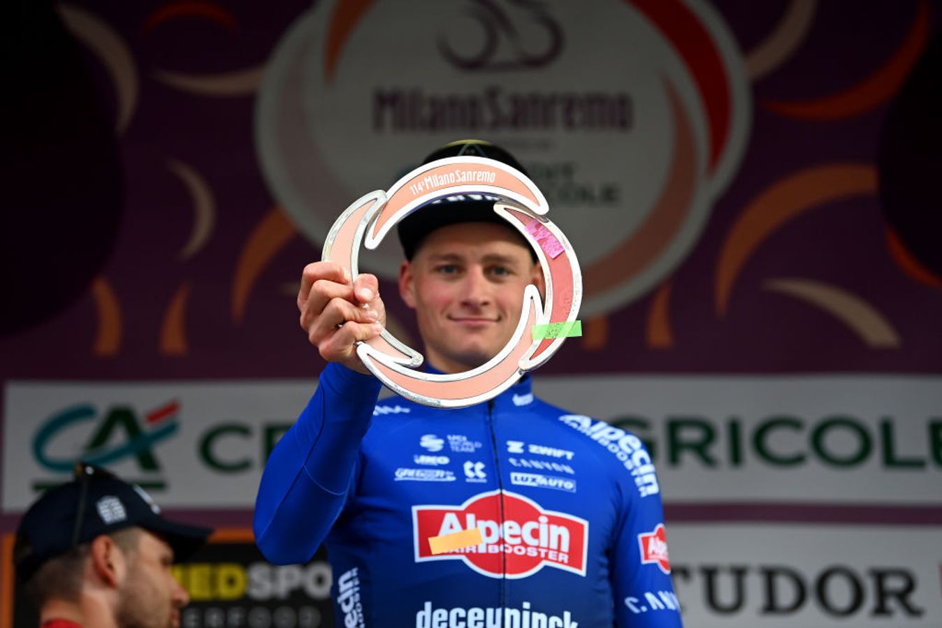 Mathieu van der Poel with the Milan-San Remo trophy in 2023