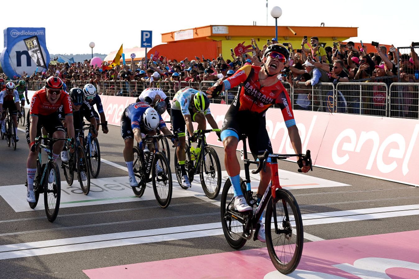 Jonathan Milan celebrates atop his Merida Reacto bike after winning stage 3 of the 2023 Giro d'Italia