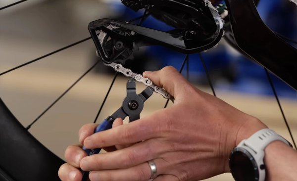 Use quick-link pliers to remove the chain from the bike