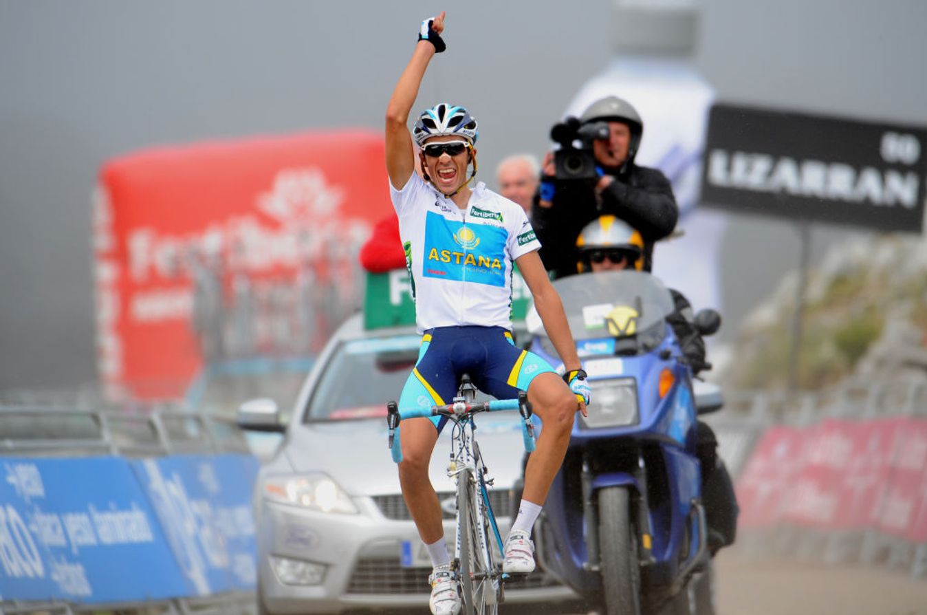 Alberto Contador fires off his Pistolero salute at the top of the Angliru