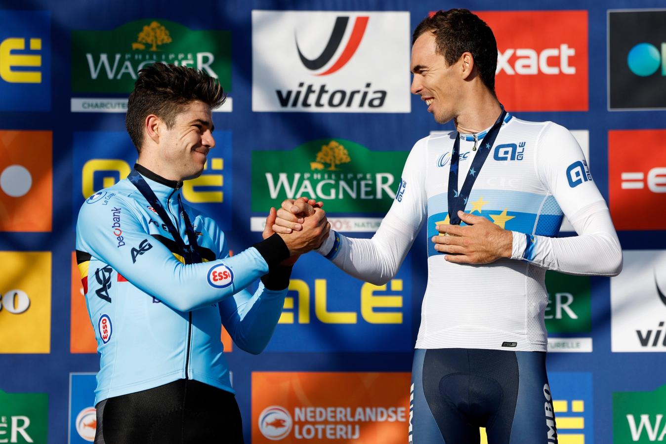 Wout van Aert congratulating his trade-teammate Christophe Laporte at the European championships