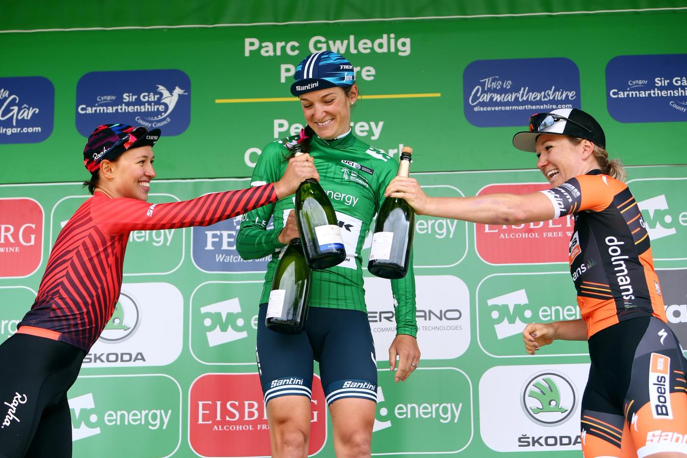 Lizzie Deignan with champagne on the overall podium of the 2019 Women's Tour