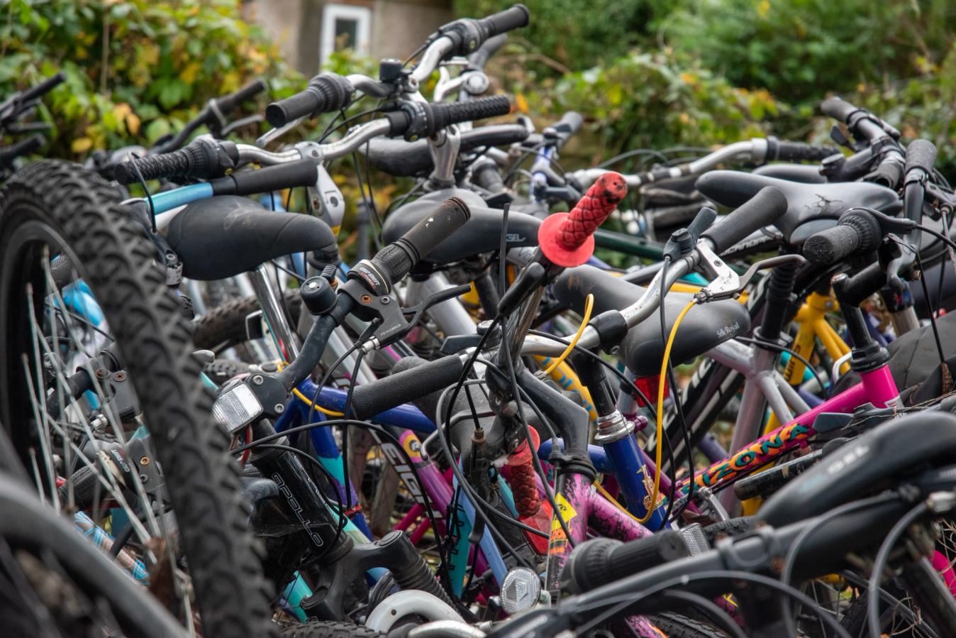 Dozens of bikes piled down the end of Mike Jones' garden