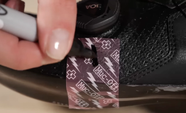 Find the balls of your feet, using tape to avoid marking your shoes