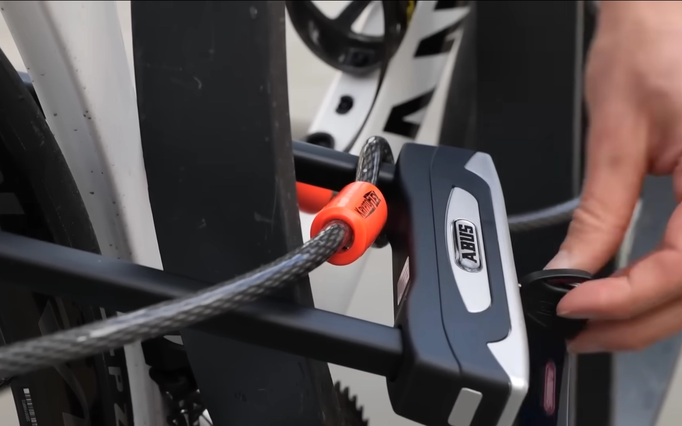 Use a sturdy D-lock for the frame, plus a cable for the wheels
