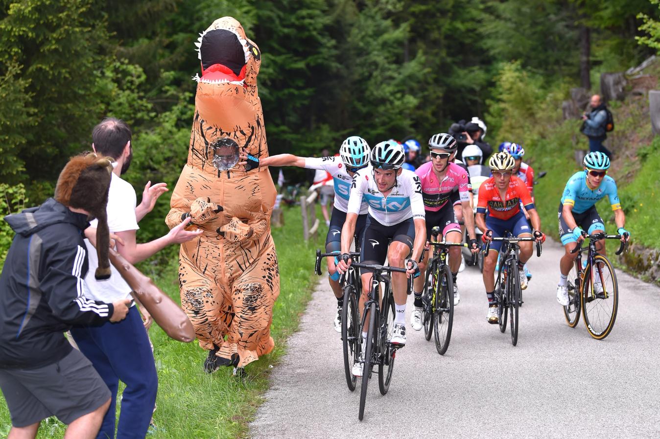 Chris Froome shoves a dinosaur on the Zoncolan