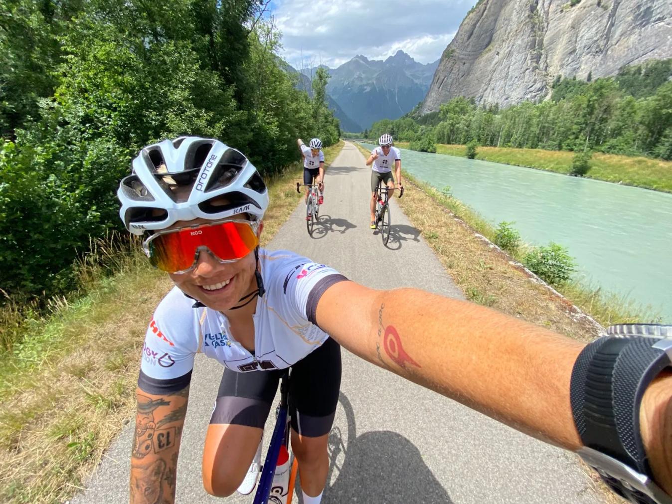 Ottilie Quince takes a selfie whilst riding along the valley surrounding Alpe d'Huez.