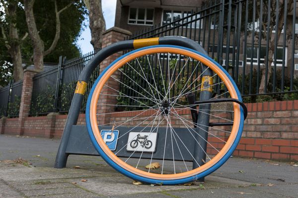 A wheel left from a stolen bicycle