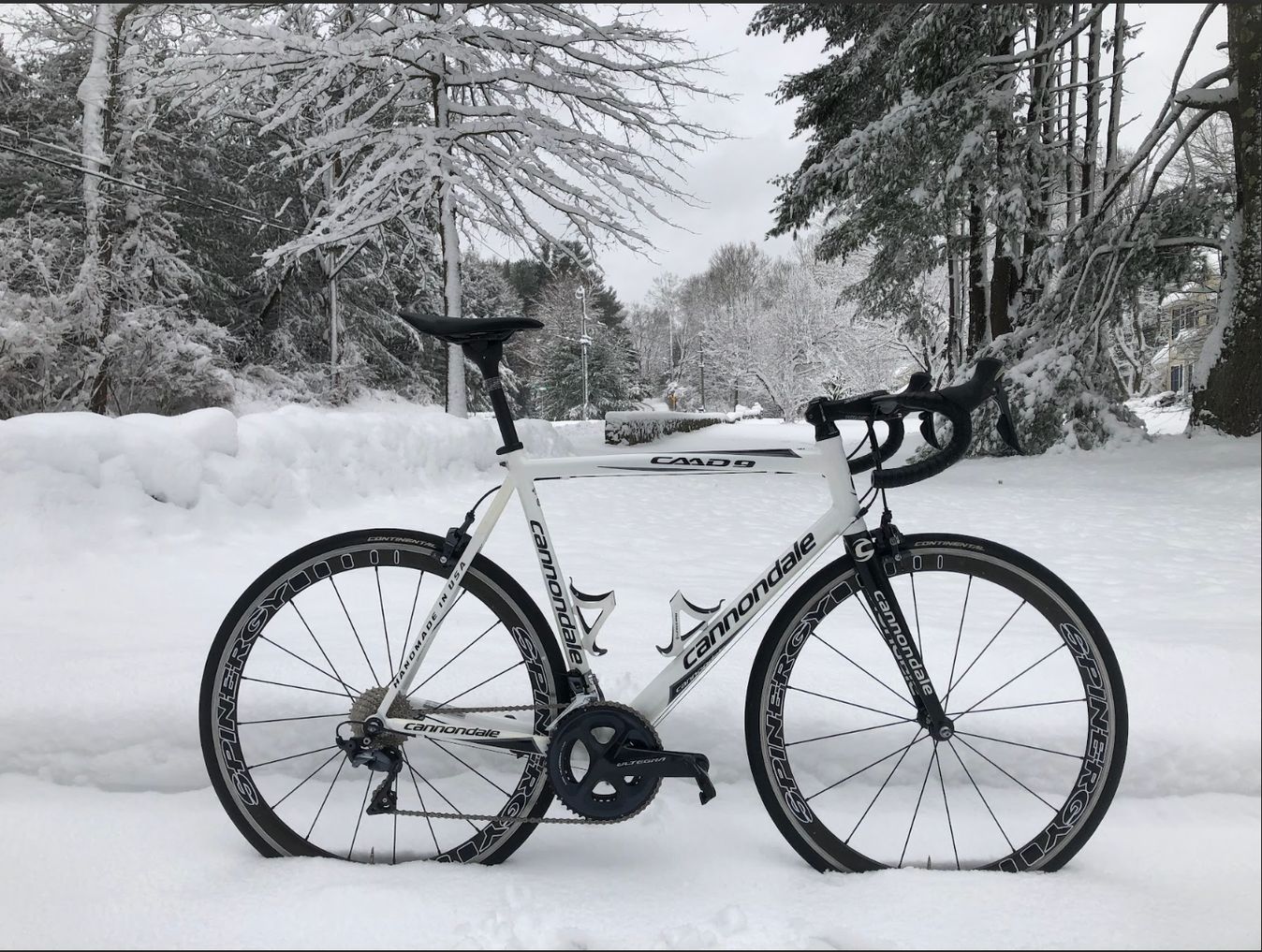 Brandon's Cannondale CAAD 9 blends in to the snow background of Danbury, USA 