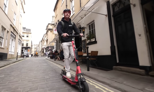 GCN presenter Hank rides an e-scooter through Bath