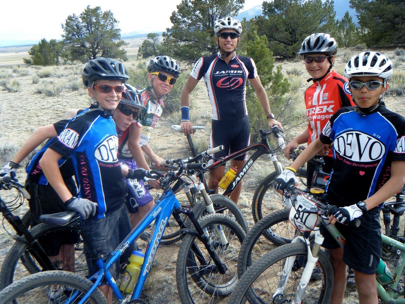 Kuss (third from left) out the mountain bikes with Chris Blevins (furthest right)